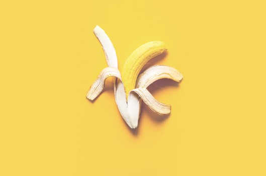 Yellow banana in white peel