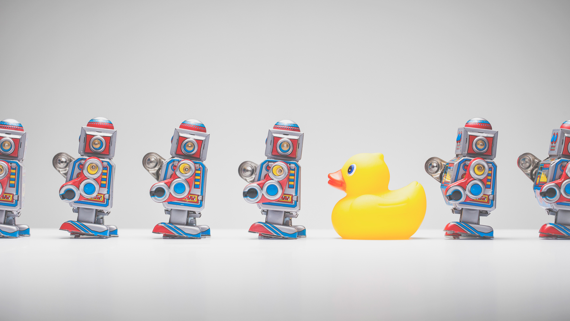 Rubber duck in line with robots